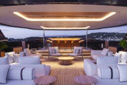 Seawolf X Yacht Rossinavi. Luxurious yacht deck with modern seating and bar