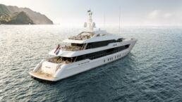 Luxury yacht on open sea near coastline. Heesen Yacht AGNETHA YN 20955