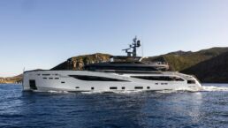 Luxury yacht cruising near coastal cliffs. Motor Yacht BEL1 Rossinavi