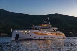 Luxury yacht on calm water at sunset. Motor Yacht BEL1 Rossinavi