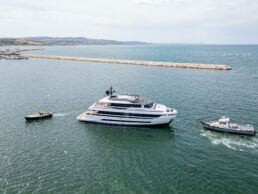 Luxury yacht escorted by smaller boats. Motor Yacht SUPER MARIO Extra Yachts