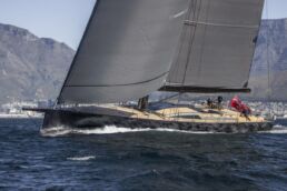 Luxury sailboat on water with mountains background Sailing Yacht GELLICEAUX Southern Wind