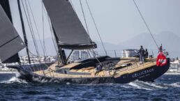 Sailboat with black sails on the water. Sailing Yacht GELLICEAUX Southern Wind