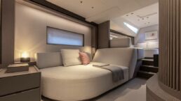 Modern luxurious bedroom with cozy lighting. Sailing Yacht GELLICEAUX Southern Wind