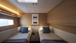 WallyWind110 Modern twin cabin with skylight and windows.