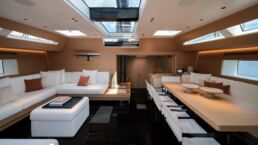 WallyWind110 Luxury modern yacht interior with white seating.