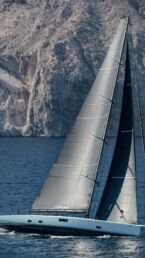 WallyWind110 Sailboat cruising near rocky cliffs