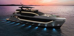 40m yacht EVO van der valk. Luxury yacht at sunset on the ocean.