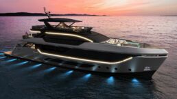 40m yacht EVO van der valk. Luxury yacht at sunset on the ocean.