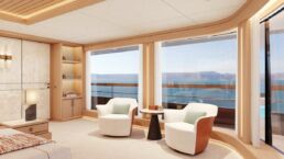 Luxury oceanview yacht master suite with modern decor.