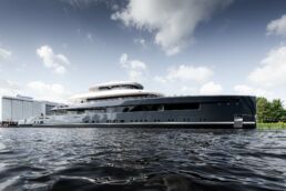 Feadship Project 713 Superyacht. Large yacht docked at shipyard