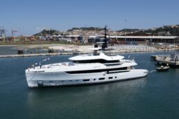 Frette Luxury yacht docked at a port.