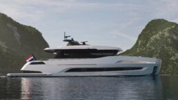 Holterman X-65 20m Motor Yacht. Luxury yacht cruising near green mountains.