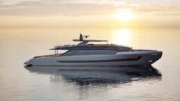 ISA Viper Motor Yacht. Luxury yacht on calm water at sunset