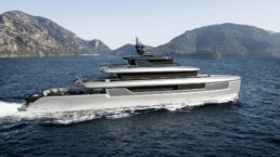 KAI BAZ Yacht Design. Modern yacht sailing near rocky coastline