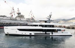 Luxury yacht docked at shipyard with cranes. Motor Yacht GO Tankoa Yachts