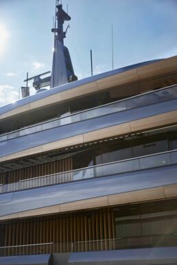 Obsidian Yacht Feadship. Modern yacht exterior against blue sky