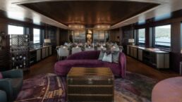 Luxury yacht interior with dining area and plush seating.