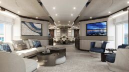 Modern luxury yacht interior with dining area.