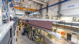 Super Fast Baltic 80 Custom Sailing Yacht. Large boat under construction in a factory