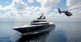 Luxury yacht with helicopter on ocean