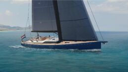 Contest 63CS Sailing Yacht. Sailboat navigating clear blue waters