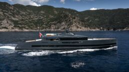 SAN Motor Yacht ALIA Yachts. Luxury yacht cruising near scenic coastline