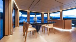 SAN Yacht Interior. Luxury yacht dining room with large windows