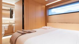 SAN Yacht Interior. Modern bedroom and bathroom with wooden decor